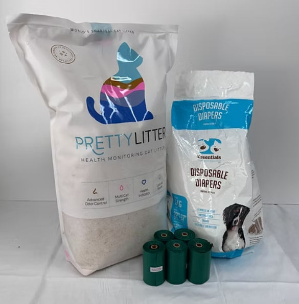 Two bags of pet products, one labeled 'Pretty Litter' and the other 'Essentials Disposable Diapers', on a white background.