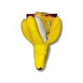 Yellow dog toy shaped like a banana with a white interior on a white background