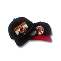 Two black baseball caps with 'Wolf Pack' logos on a white background