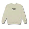 Beige sweatshirt with text 'tell your cat I said hi' on a white background